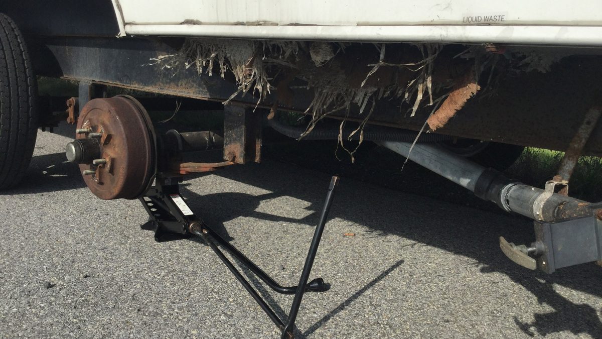 Camper floor destroyed by a blown tire while towing.