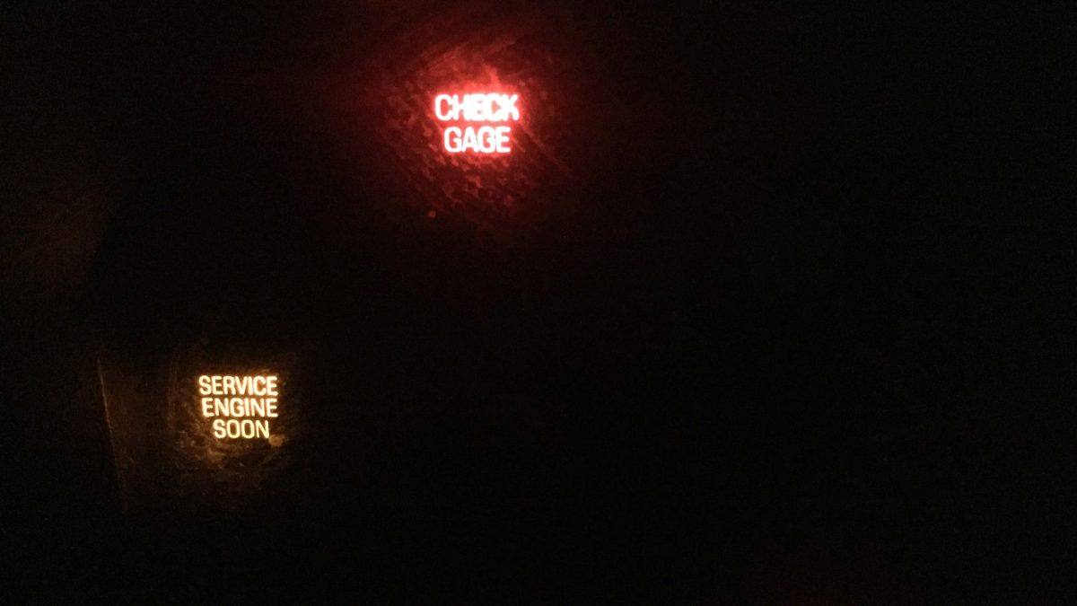 Glowing engine lights in Ford Expedition dashboard after blowing an engine while towing.