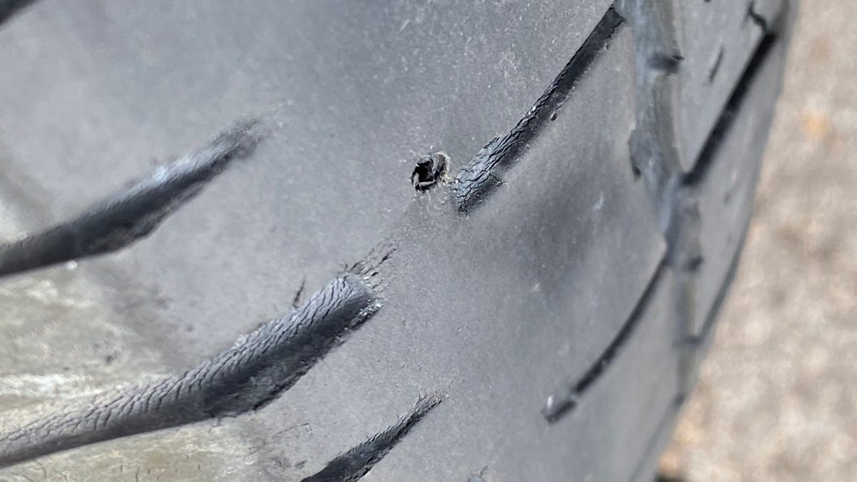 Screw hole in truck tire.